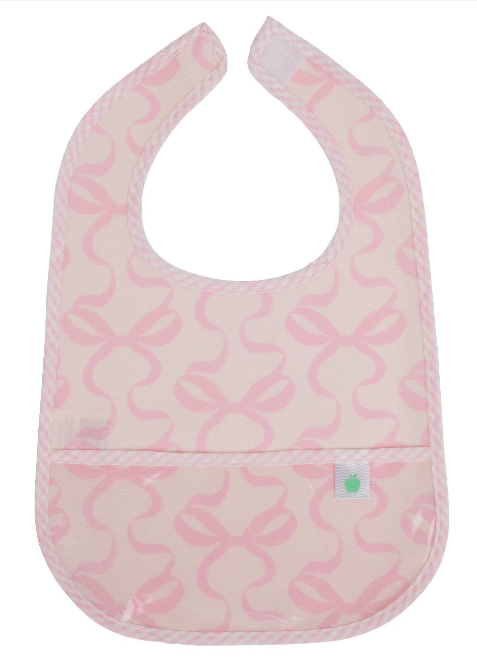 The Wipe It Bib in Bows on Pink